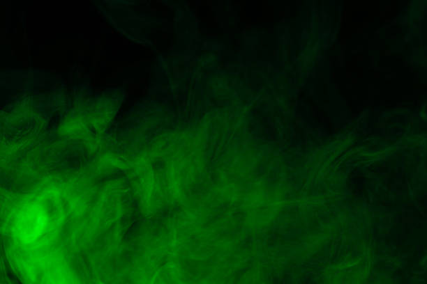 istock Green steam on a black background. 1266732812