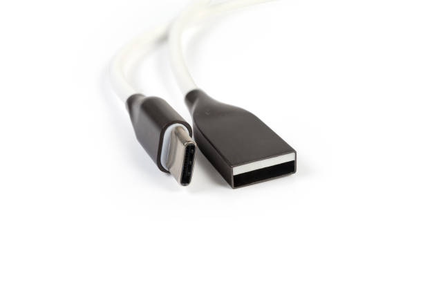 istock Connectors USB-A and USB-C on cable close-up 1266734613