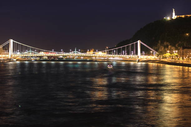 istock Szechenyi chain bridge at night in Budapest 1266740675