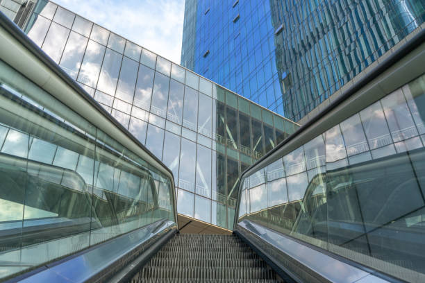 istock escalator and modern office buildings in downtown. 1266741963