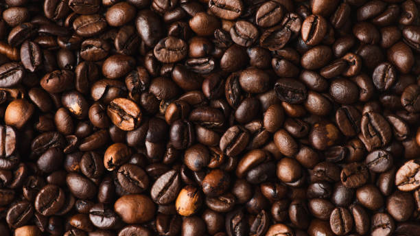 istock top view of fresh roasted coffee beans background 1266742353