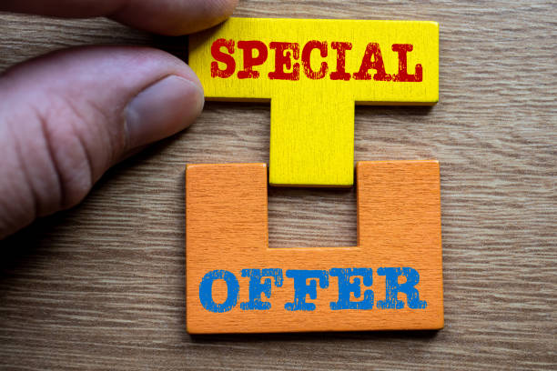 SPECIAL OFFER concept. Colored wooden blocks, puzzle and mind game. Wooden background