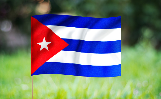 Waving flag of Cuba isolated on white background