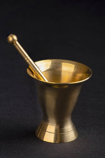 istock Miniature Brass Pestle and Mortar 1266745076