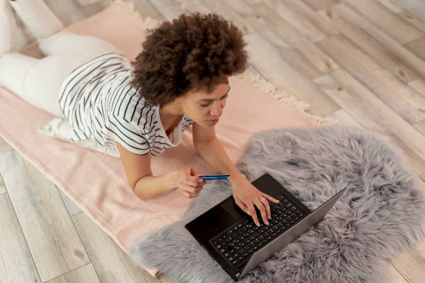 istock Woman shopping online 1266745732