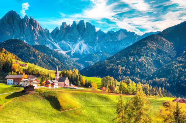 istock Captivating scenery in Dolomites with the St. John's in Ranui Chapel. 1266746412