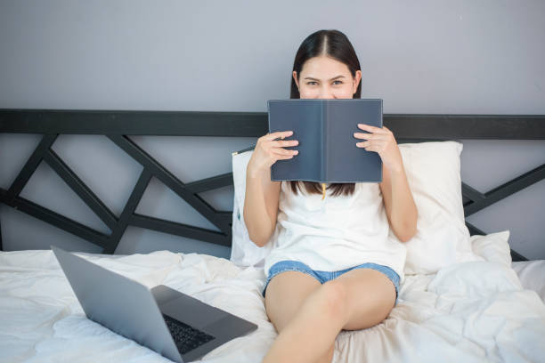 istock Beautiful woman is working from home 1266746940