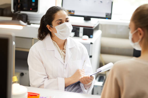 istock Doctor talking to patient 1266746971