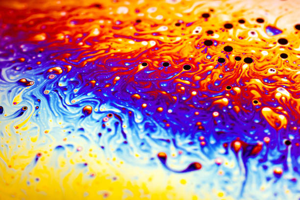 istock Beautiful psychedelic abstraction formed by light on the surface of a soap bubble 1266749053