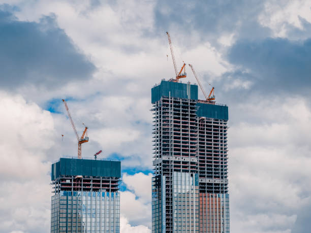 istock Construction work site and high rise building. High-rise building under construction. Reinforced concrete frame 1266750086