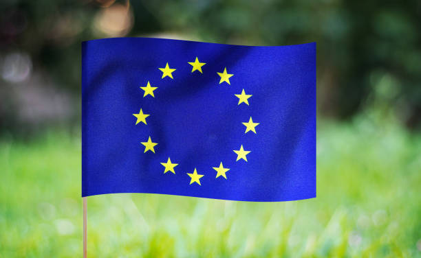 istock European union flag waving on a green background. 1266750198