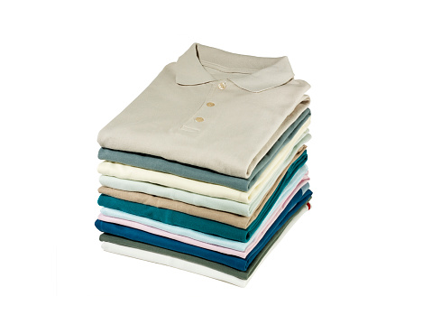 folded shirts on white background