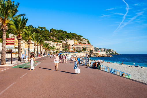 NICE, FRANCE - SEPTEMBER 25, 2018: The Promenade des Anglais is a promenade along the Mediterranean at Nice city, Cote d'Azur region in France