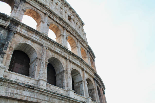 istock section of colosseum against white 1266755352