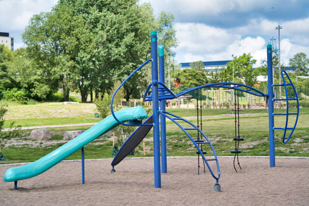 istock Blue slide in the park 1266756959