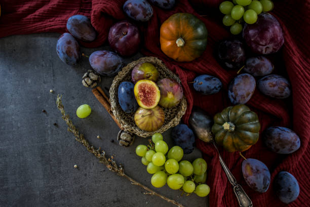 istock Table full of fresh fruits and vegetables. Copy space. 1266758126