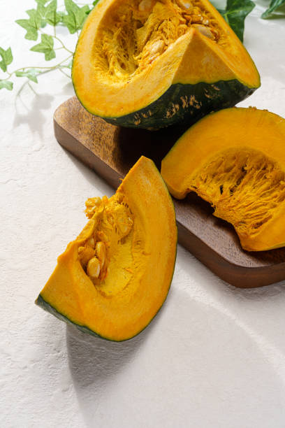 istock Fresh Japanese pumpkin with pumpkin seeds 1266764942