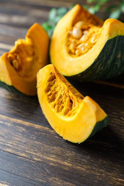 istock Fresh Japanese pumpkin with pumpkin seeds 1266764983