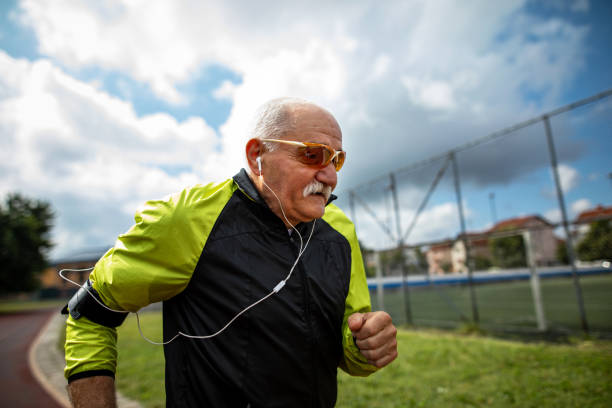istock Active senior man running in the city 1266767614