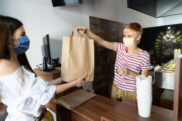 istock Ordering takeout amid the coronavirus pandemic 1266768918