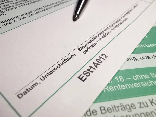 istock Ballpoint pen and tax return 1266770560