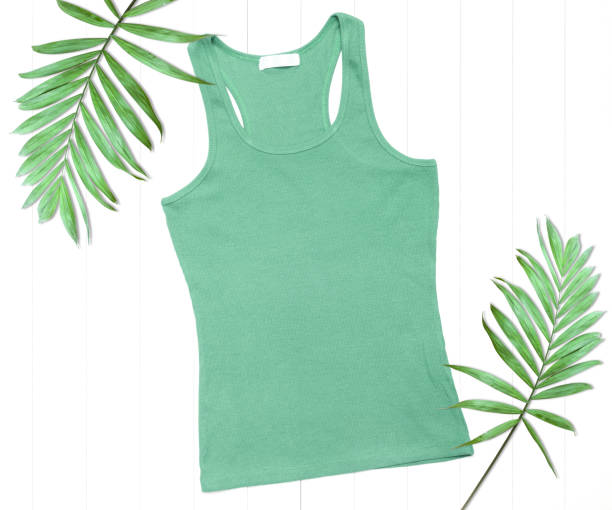 istock Green tank top with palm leaves on a white background 1266772235