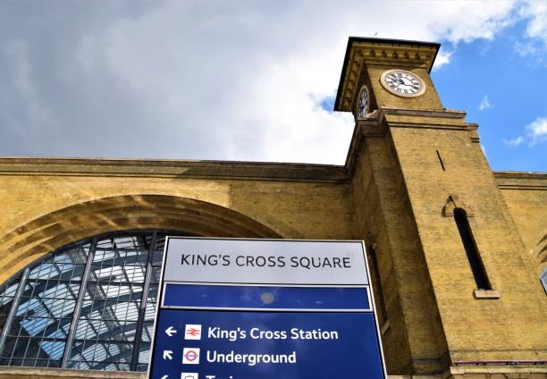 London, United Kingdom - August 17 2020: King's Cross Square sign and station clock tower exterior view