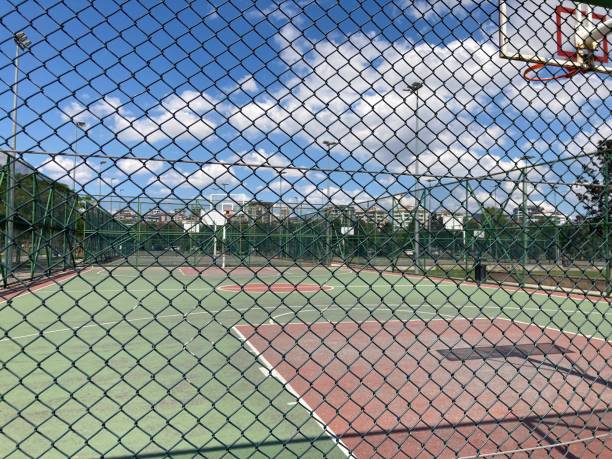 istock empty basketball court view in sunny day 1266773739