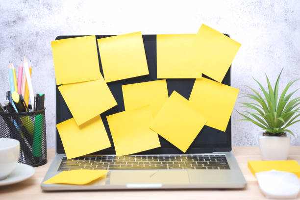 istock Yellow post-it on the laptop. memo paper on a screen laptop computer 1266773805