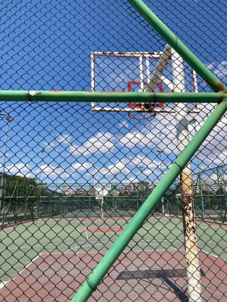 istock empty basketball court view in sunny day 1266773831
