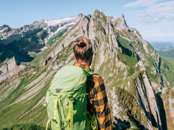 istock Man hikes in the Swiss Alps 1266780428