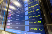 Cancelled all flight on flight information board at airport effect from COVID-19 pandemic