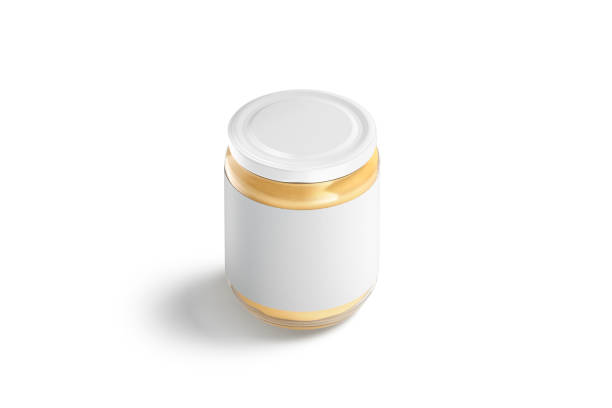 istock Blank glass jar with white label and peanut butter mockup 1266782214