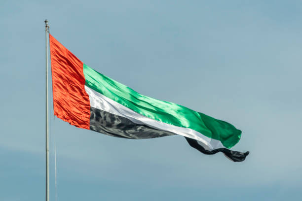 istock UAE flag during windy time, blurred photo, Selective focus, Selective focus on subject, background blur 1266784145