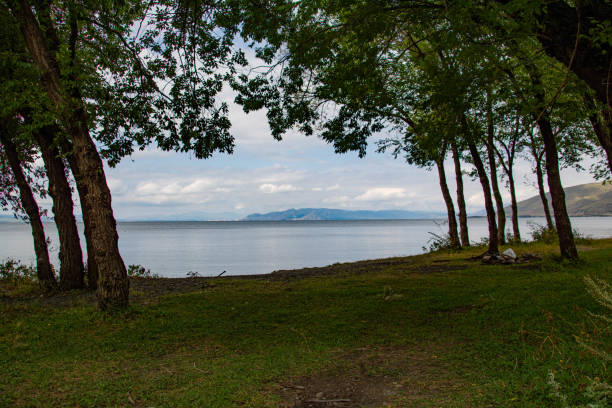 istock Beautiful landscape with lake and forest 1266784208