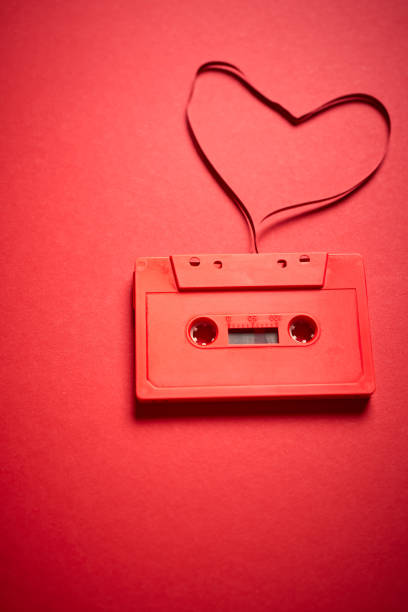 istock old red cassette tape on a minimalist background 1266787935