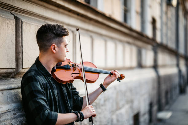 istock Street violin player 1266790361