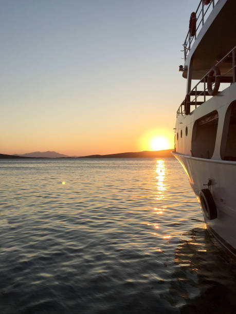 istock Boat at sunset view from the seaside 1266791950