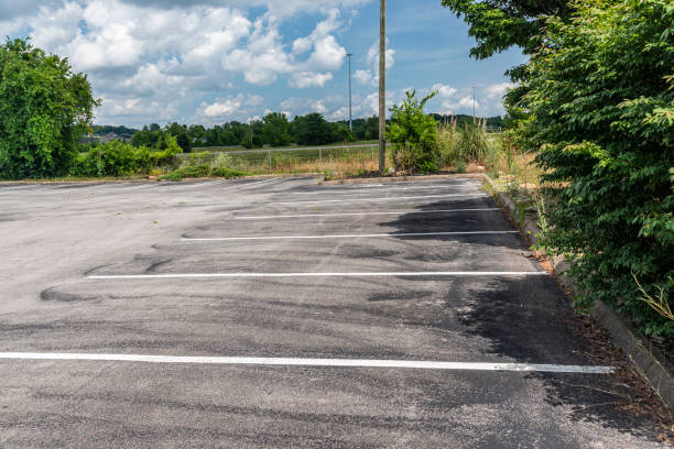 istock Empty Customer Parking Lot of Failed Restaurant After Pandemic 1266794444