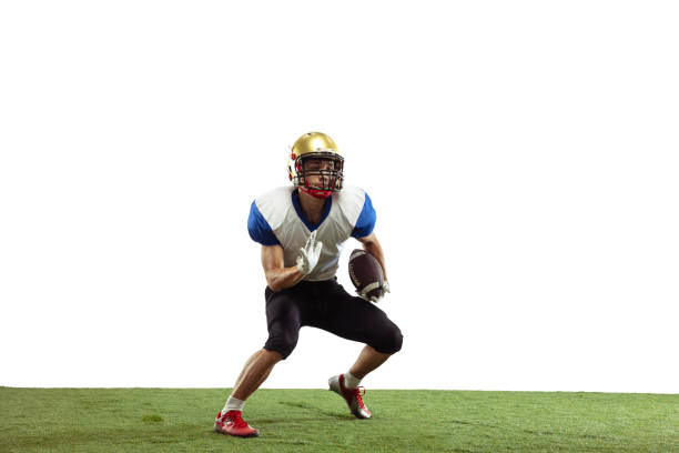 istock American football player in action isolated on white studio background 1266795976