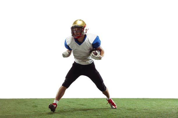 istock American football player in action isolated on white studio background 1266796001