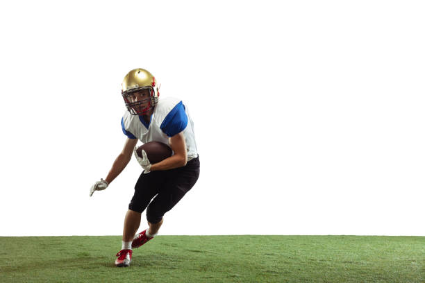 istock American football player in action isolated on white studio background 1266796016
