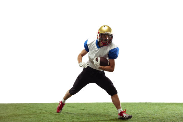 istock American football player in action isolated on white studio background 1266796028