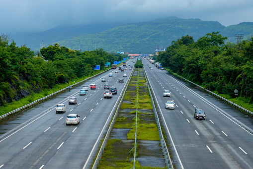 Pune, India - August 15 2020: The Mumbai-Pune Expressway during the monsoon season near Pune India. Monsoon is the annual rainy season in India from June to September.