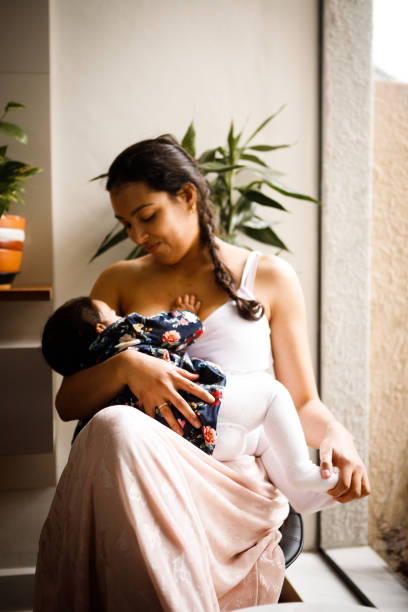 istock mother breastfeeding her baby 1266799239