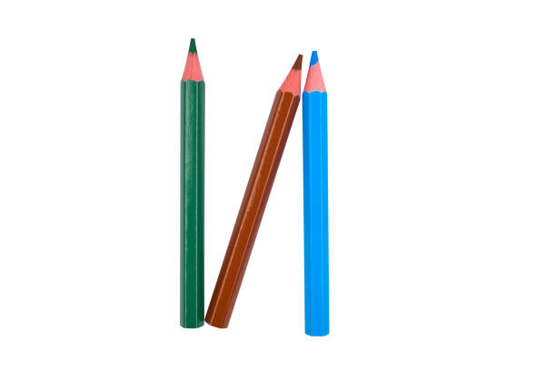istock N letter written with some different colored wood pencil crayons on white paper 1266799801