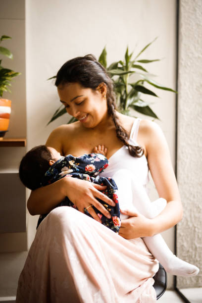istock mother breastfeeding her baby 1266800354
