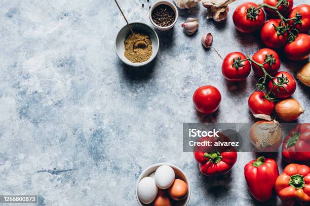 Ingredients Of Shakshuka On Kitchen Counter Stock Photo - Download Image Now - Tomato, Marble - Rock, Marbled Effect