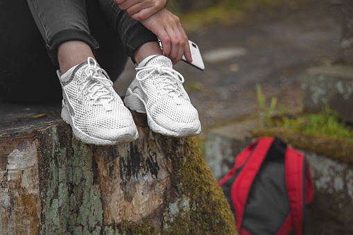 female white sneakers foot wear outdoor environment space