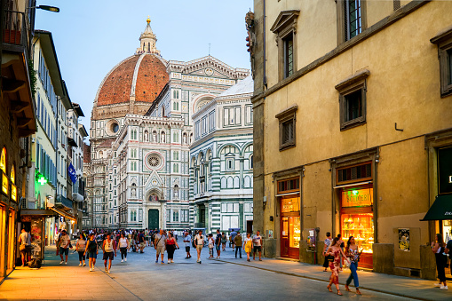 Florence, Italy, August 11 - An evening view of the Cathedral of Santa Maria del Fiore, by Brunelleschi, also known as the Duomo of Florence, with the presence of dozens of tourists and Florentines. The Duomo is the third Cathedral in Europe, after St. Peter's in Rome and St. Paul's in London. The construction work began in 1296, while the consecration of the temple took place in 1436. Image in High Definition format.